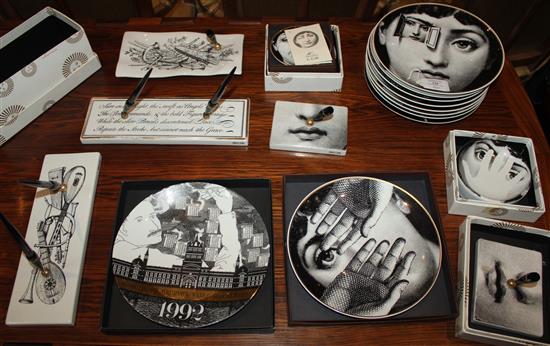 A collection of Fornasetti Temi e Variazioni and musical trophy pattern items,